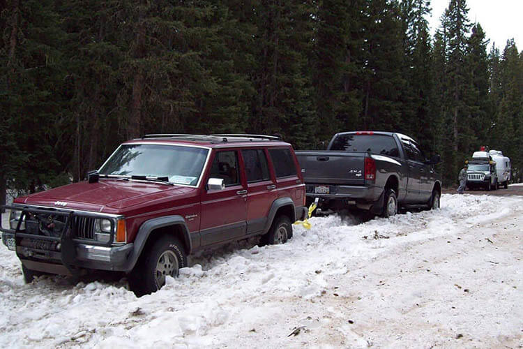 truck pulling in snow