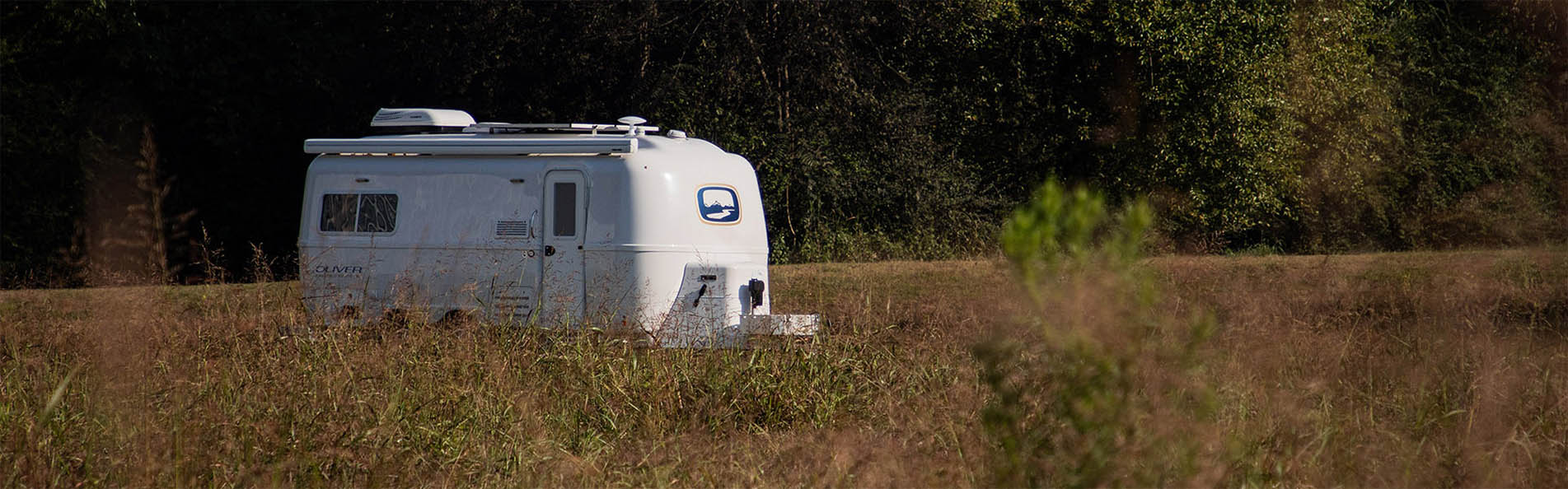 traveling trailer in the forest